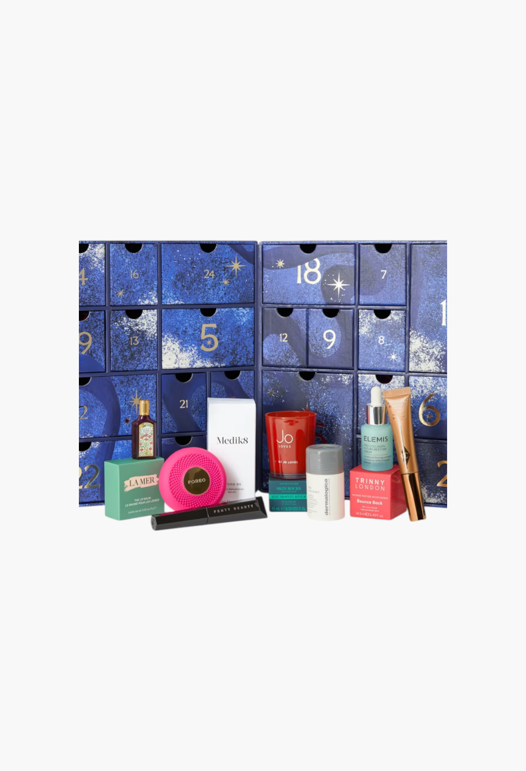 GLAM MODA beauty advent calendar featuring luxury skincare and makeup products in front of a blue starry box.