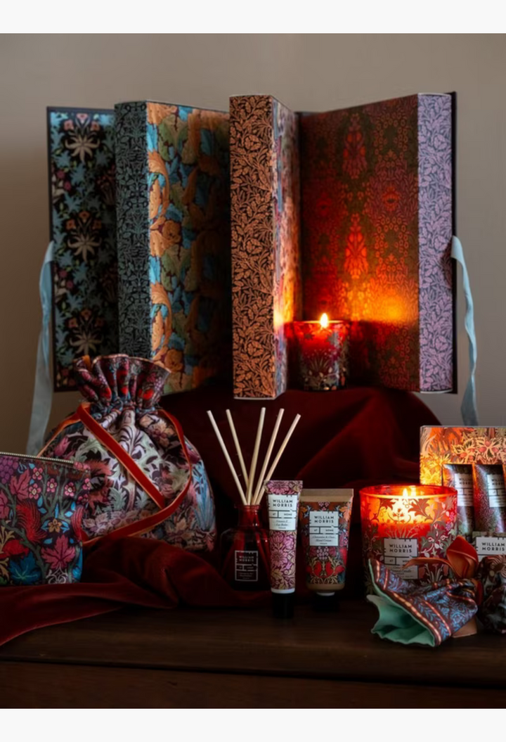 GLAM MODA William Morris At Home 2026 beauty advent calendar with Oak & Willow pattern, candles, and bath products.
