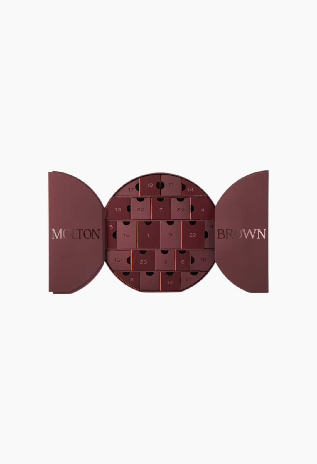 GLAM MODA Decadent Delights Advent Calendar in a deep red circular box with numbered drawers and open side panels.