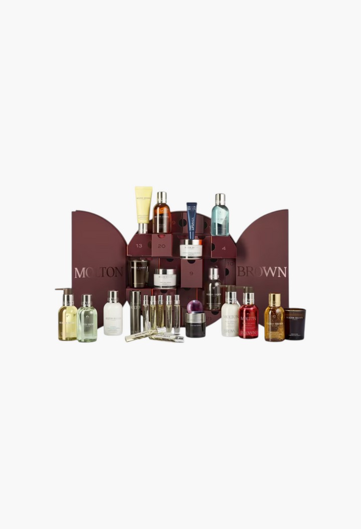 GLAM MODA Decadent Delights Advent Calendar featuring 24 luxury bath, body, and fragrance products in a gift box.