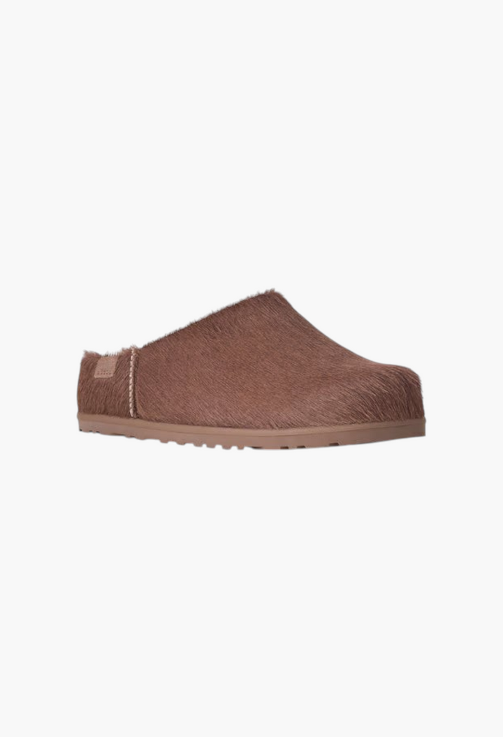 GLAM MODA Otzo brown calf hair clog with a contoured EVA footbed and lightweight rubber outsole, side view.