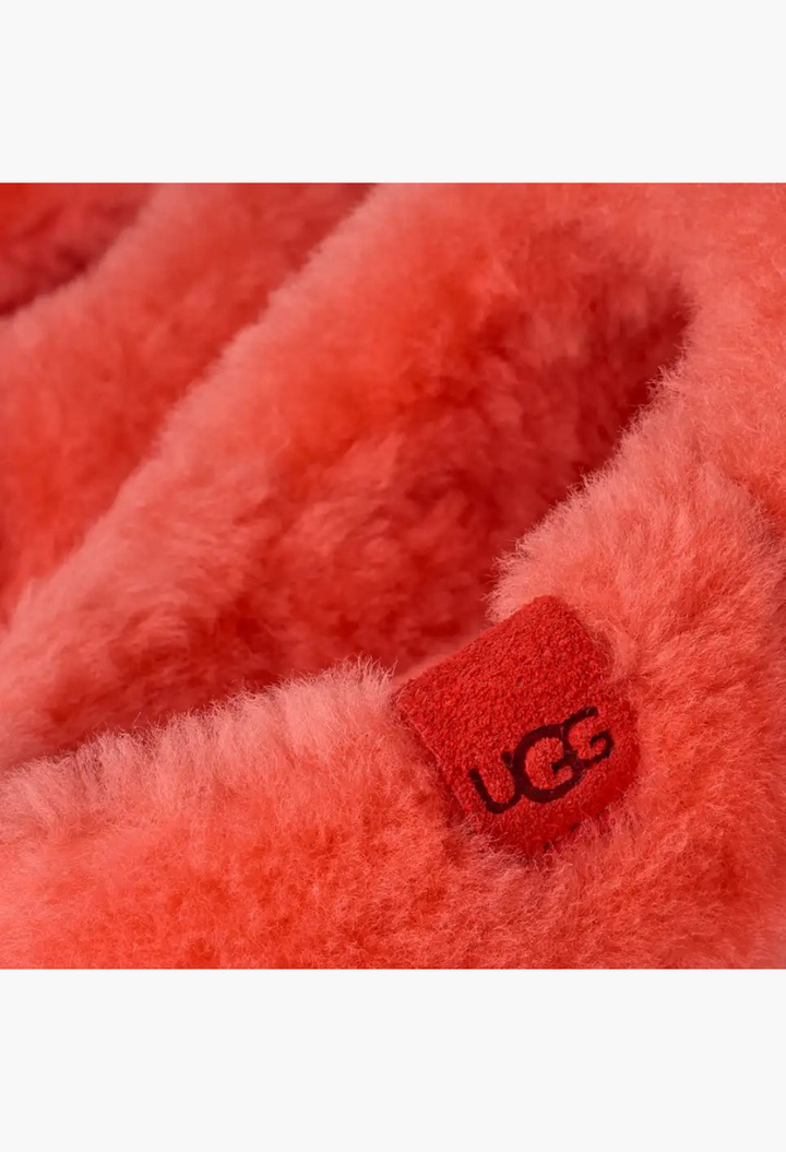 GLAM MODA Elea fluffed slip-on slipper in vibrant red sheepskin with a branded suede logo label