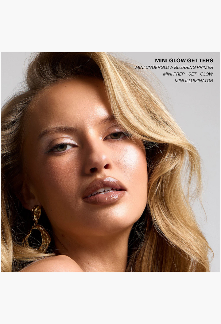 GLAM MODA Mini Glow Getters set featuring a model with radiant, dewy skin, highlighting the primer, illuminator, and spray.