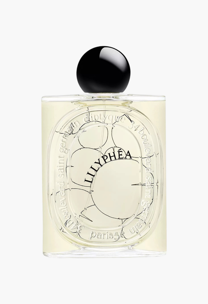 GLAM MODA Lilyphéa Eau de Parfum in a clear glass bottle with a black cap and water lily illustration on the label.