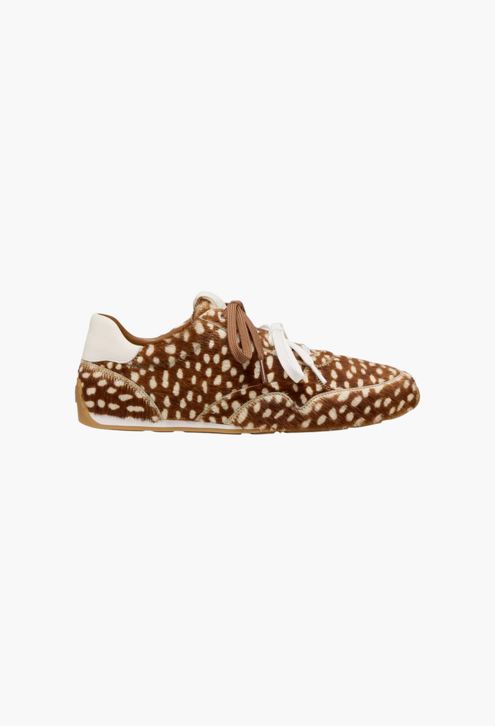 GLAM MODA Women's Bond Sport Sneakers featuring a brown and white animal print calf hair upper and lace-up closure.