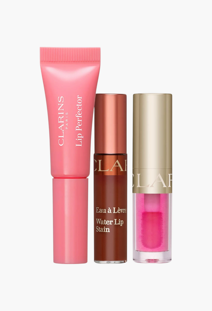 GLAM MODA Mini Lip Hits gift set featuring a pink Lip Perfector, brown Water Lip Stain, and pink Lip Comfort Oil.
