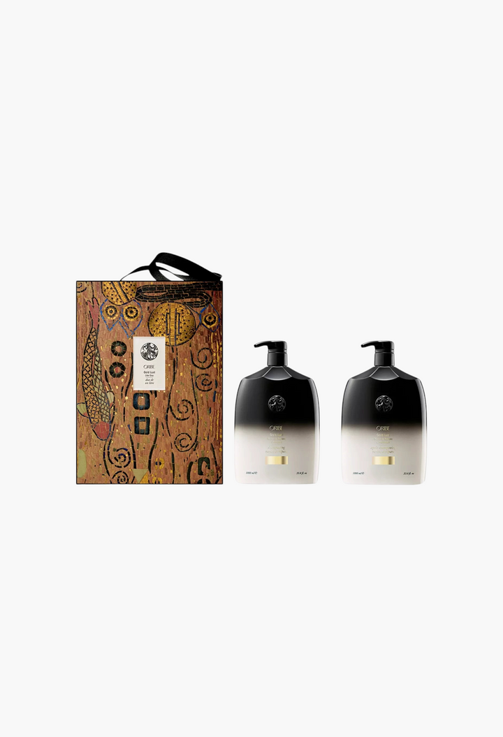 GLAM MODA Oribe Gold Lust shampoo and conditioner luxury gift set with decorative box and two large pump bottles.