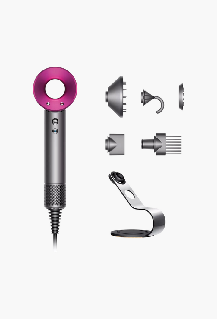 GLAM MODA Dyson Supersonic hair dryer in pink and grey with display stand and five magnetic styling attachments