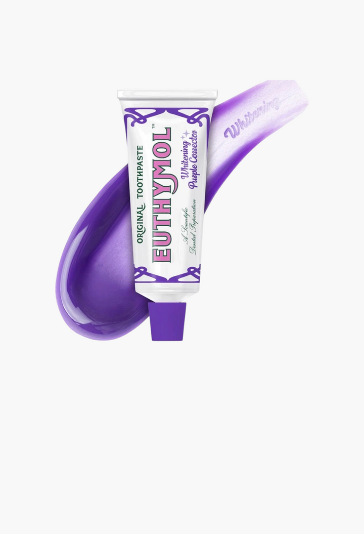 GLAM MODA EUTHYMOL purple whitening toothpaste tube with a vibrant purple paste smear for sensitive teeth