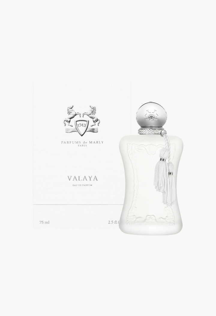 GLAM MODA Parfums de Marly Valaya Eau de Parfum in a white sculptural bottle with a tassel next to its white box.