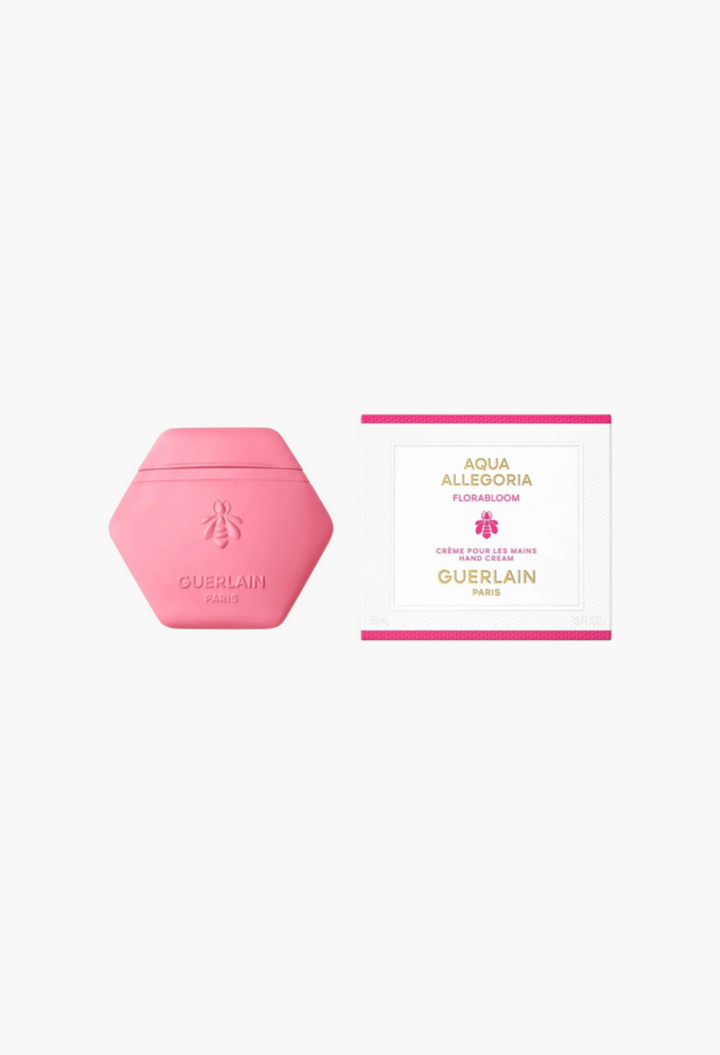 GLAM MODA Guerlain Aqua Allegoria Florabloom hand cream in a pink honeycomb tube with its matching floral box packaging.