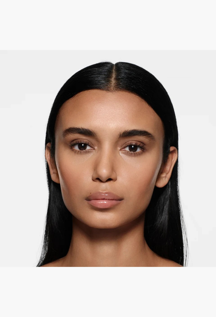 GLAM MODA Posh Gloss High Shine Lip on a model with natural, glossy lips and a smooth, hydrated finish.