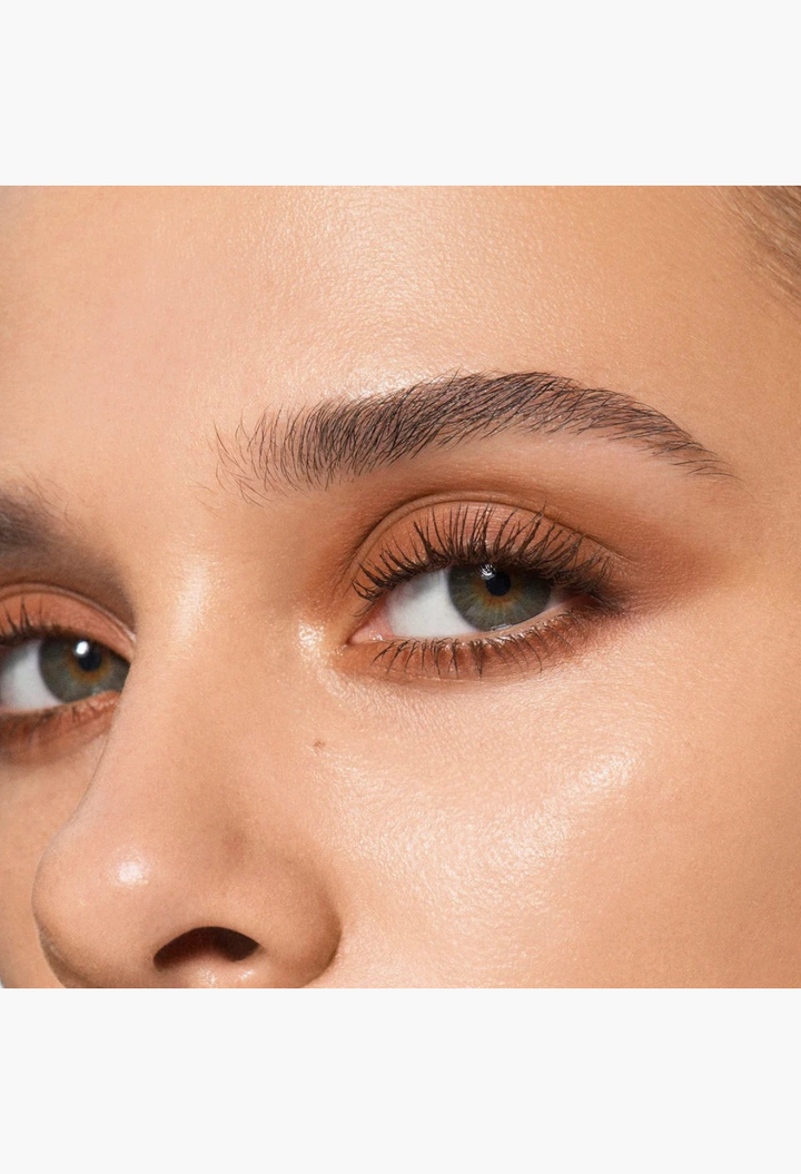 Close-up of a model wearing warm brown eyeshadow from the GLAM MODA Eye Wardrobe palette, showcasing a natural look.