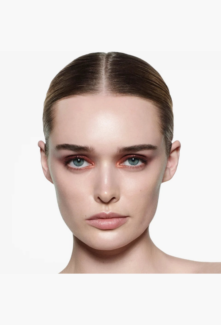 Model wearing warm-toned eyeshadow from the GLAM MODA Eye Wardrobe palette with a smooth, blendable finish.