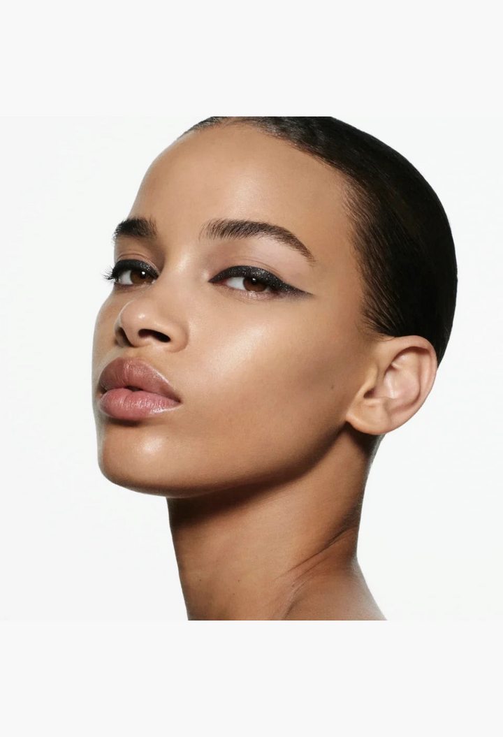 GLAM MODA model wearing a sharp, winged eyeliner look created with the Eye Wardrobe Multi-Finish Eyeshadow Palette
