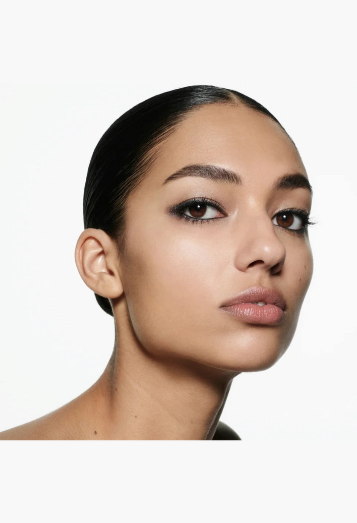 Model wearing a sophisticated smoky eye look created with the GLAM MODA Eye Wardrobe Multi-Finish Eyeshadow Palette