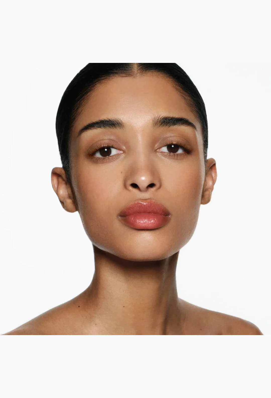 GLAM MODA Posh Balm Nourishing Lip Shine on a model with a natural, glossy, and hydrated finish.