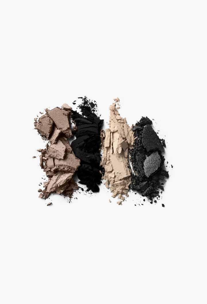 GLAM MODA Eye Wardrobe eyeshadow palette swatches in shimmering beige, matte tan, metallic bronze, and deep brown.