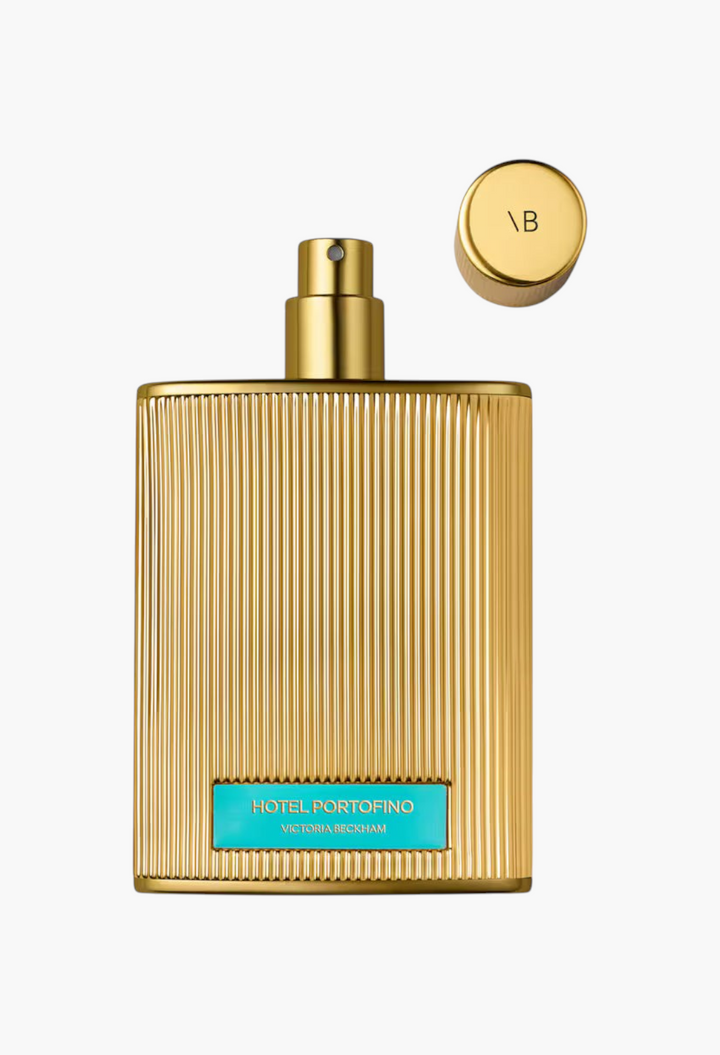 GLAM MODA Hotel Portofino Extrait de Parfum in a gold ribbed bottle with a turquoise label and matching gold cap.