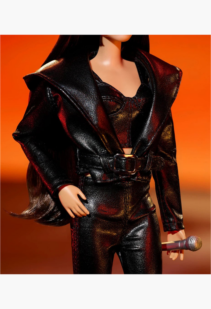 GLAM MODA collectible Miley Cyrus Barbie doll wearing a black faux-leather outfit with a microphone accessory