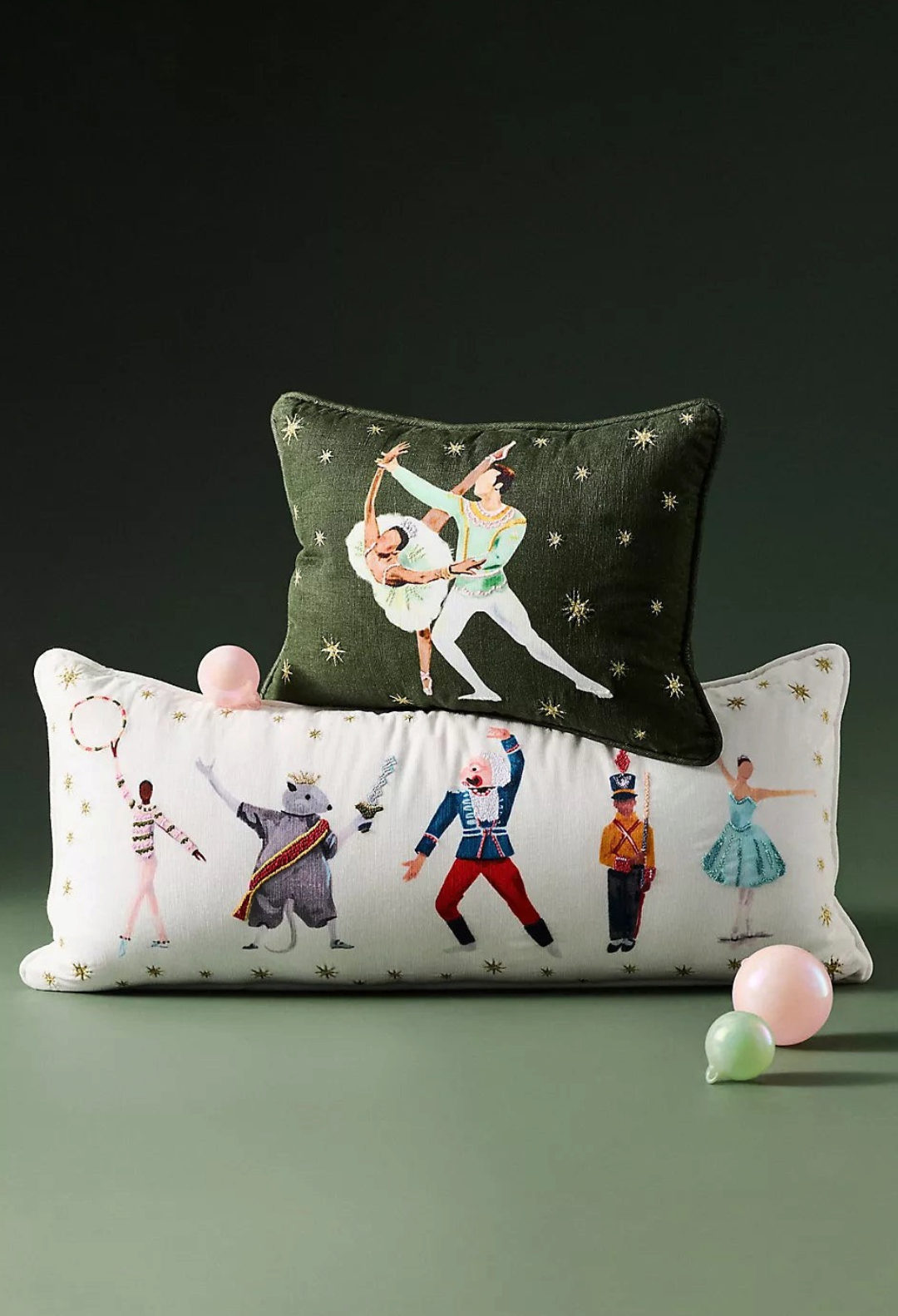 GLAM MODA cotton woven pillows featuring embroidered Nutcracker ballet characters and dancers on green and white fabric