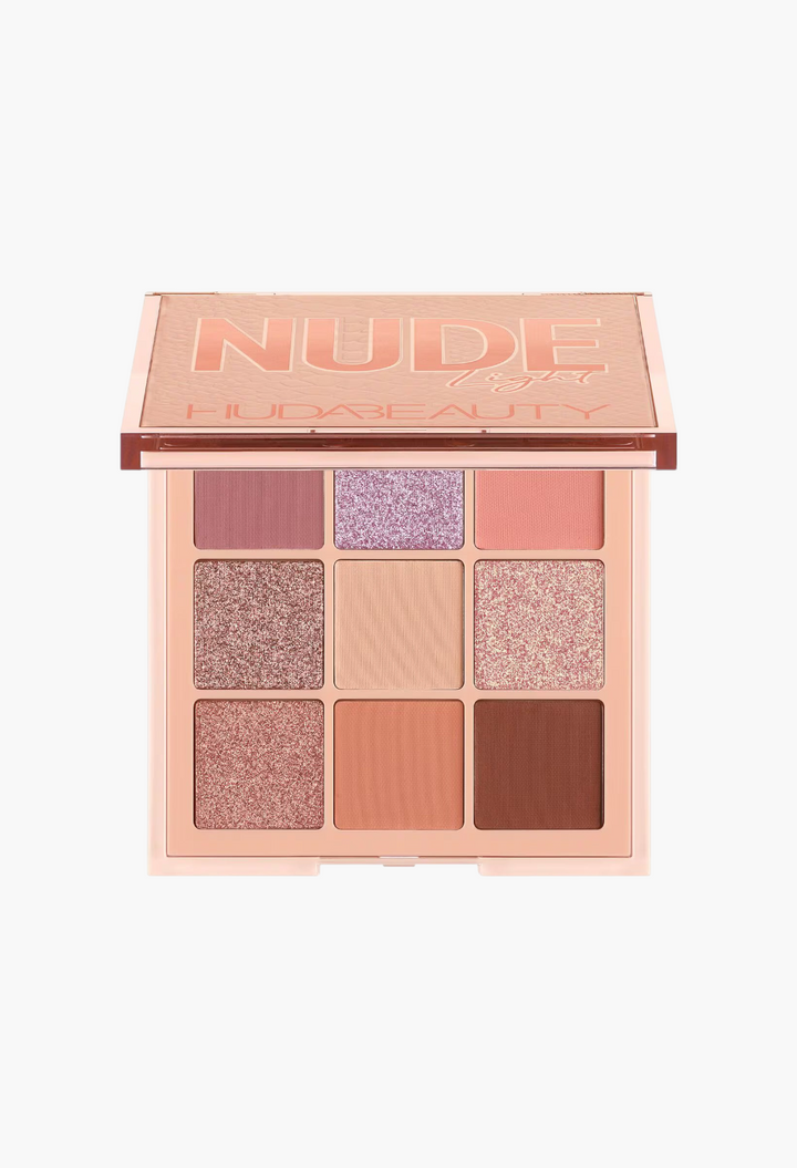 GLAM MODA Nude Obsessions Light eyeshadow palette with 9 matte and shimmer shades in peachy, mauve, and brown tones.