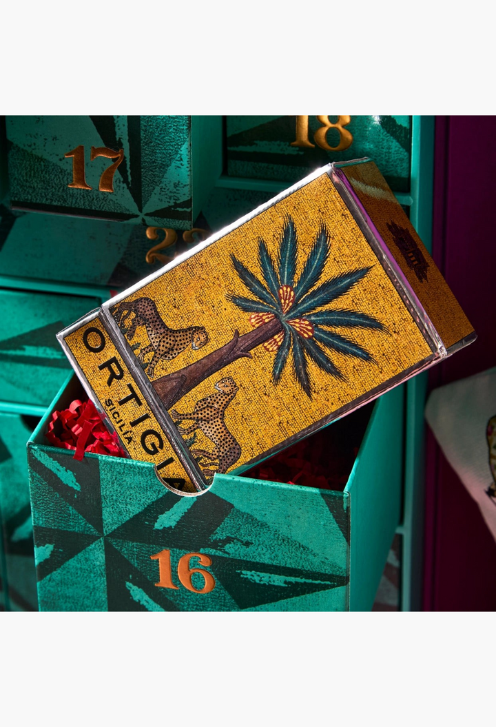 GLAM MODA beauty advent calendar drawer 16 featuring an Ortigia Sicilia product with a leopard and palm tree design