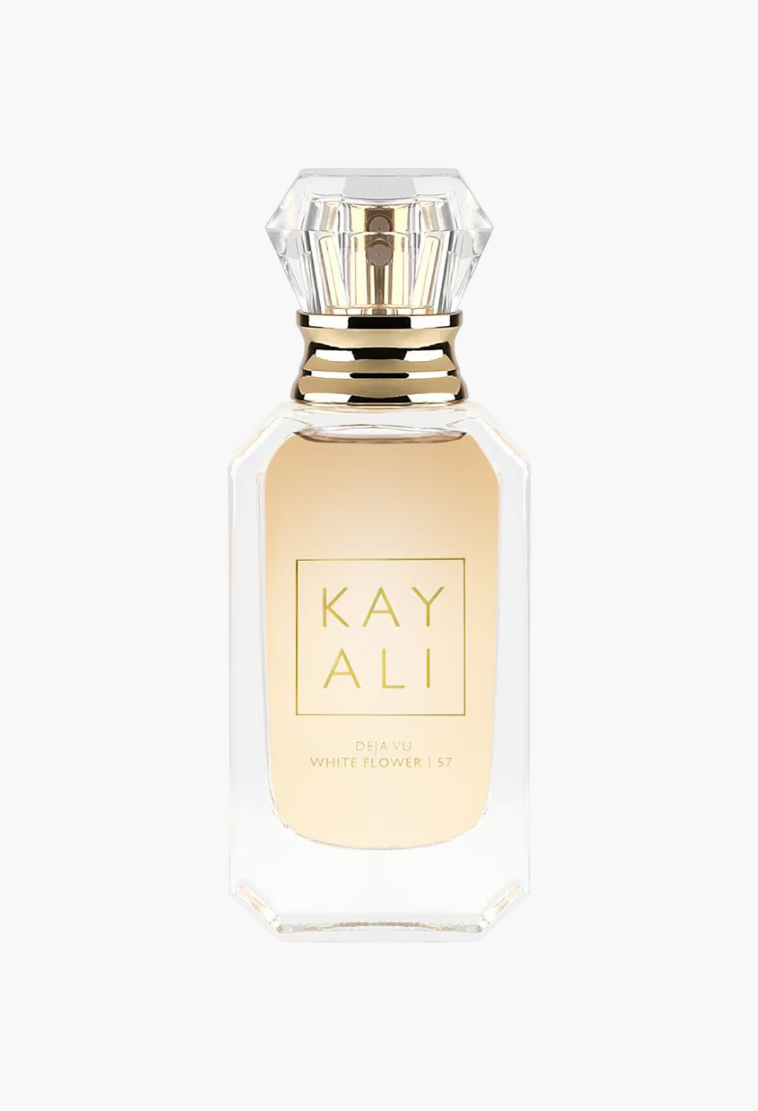 GLAM MODA Kayali Déjà Vu White Flower 57 perfume bottle with a gold label and diamond-shaped crystal cap.