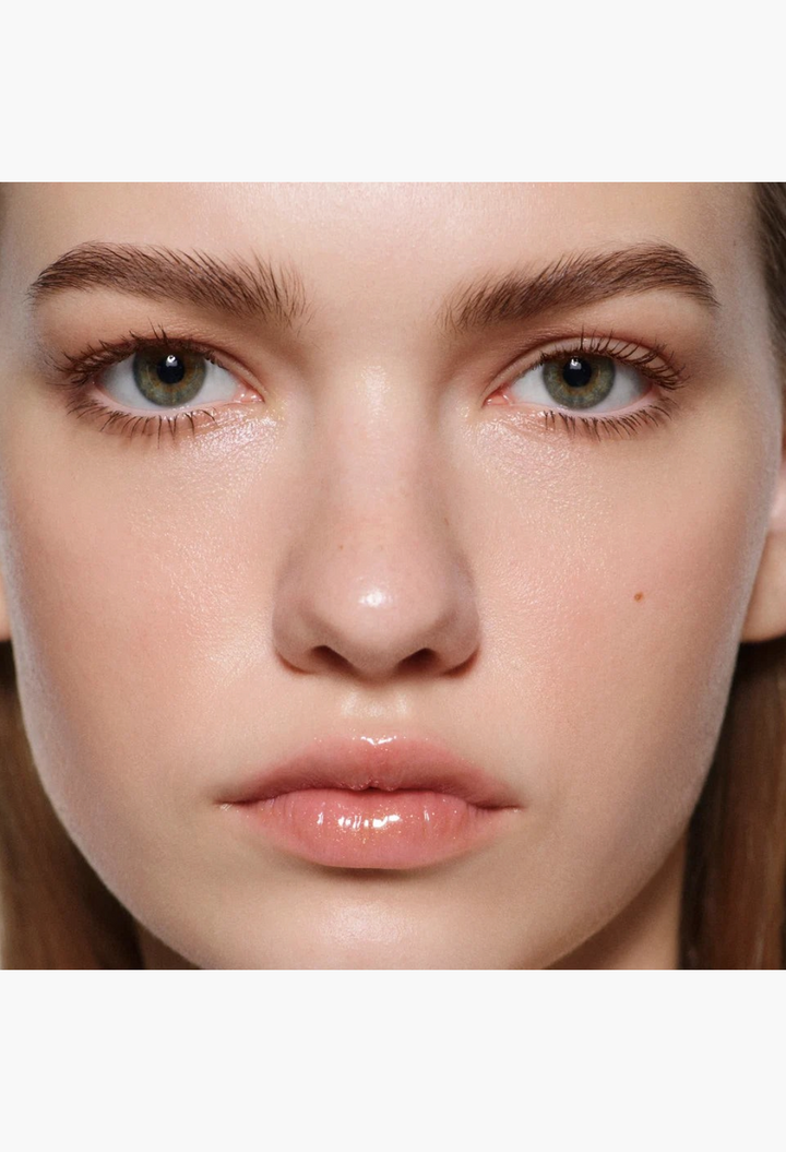 GLAM MODA Posh Balm Nourishing Lip Shine on a model, showing a natural, glossy, and hydrated lip finish.