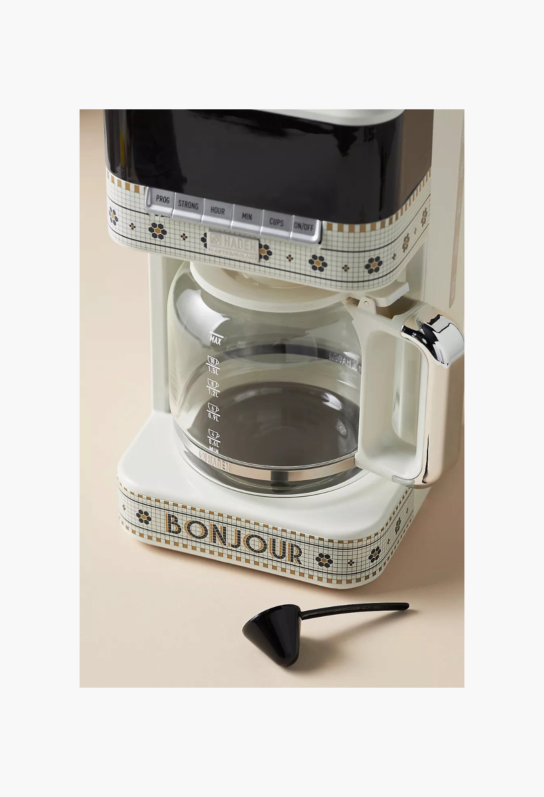GLAM MODA Bistro Tile 12-cup coffee maker in white with 24k gold floral mosaic decals and Bonjour text on glass pot