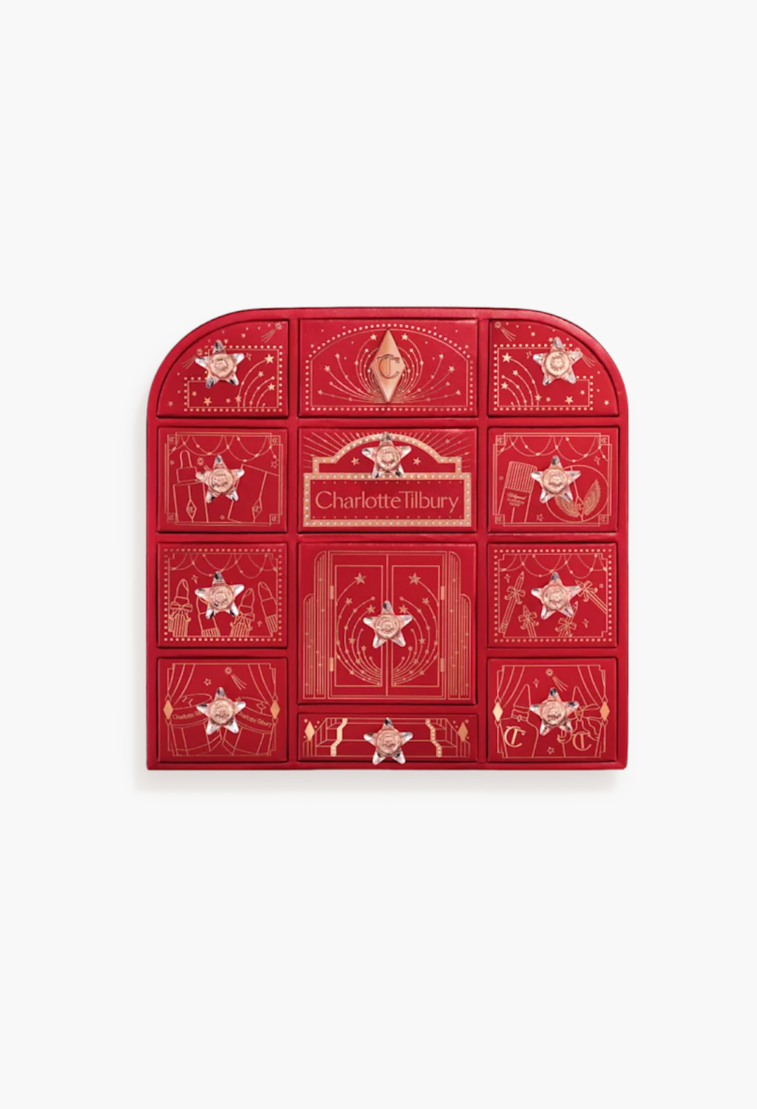 GLAM MODA Charlotte Tilbury Hollywood Beauty Wonderland advent calendar in red with gold star-shaped drawer handles.