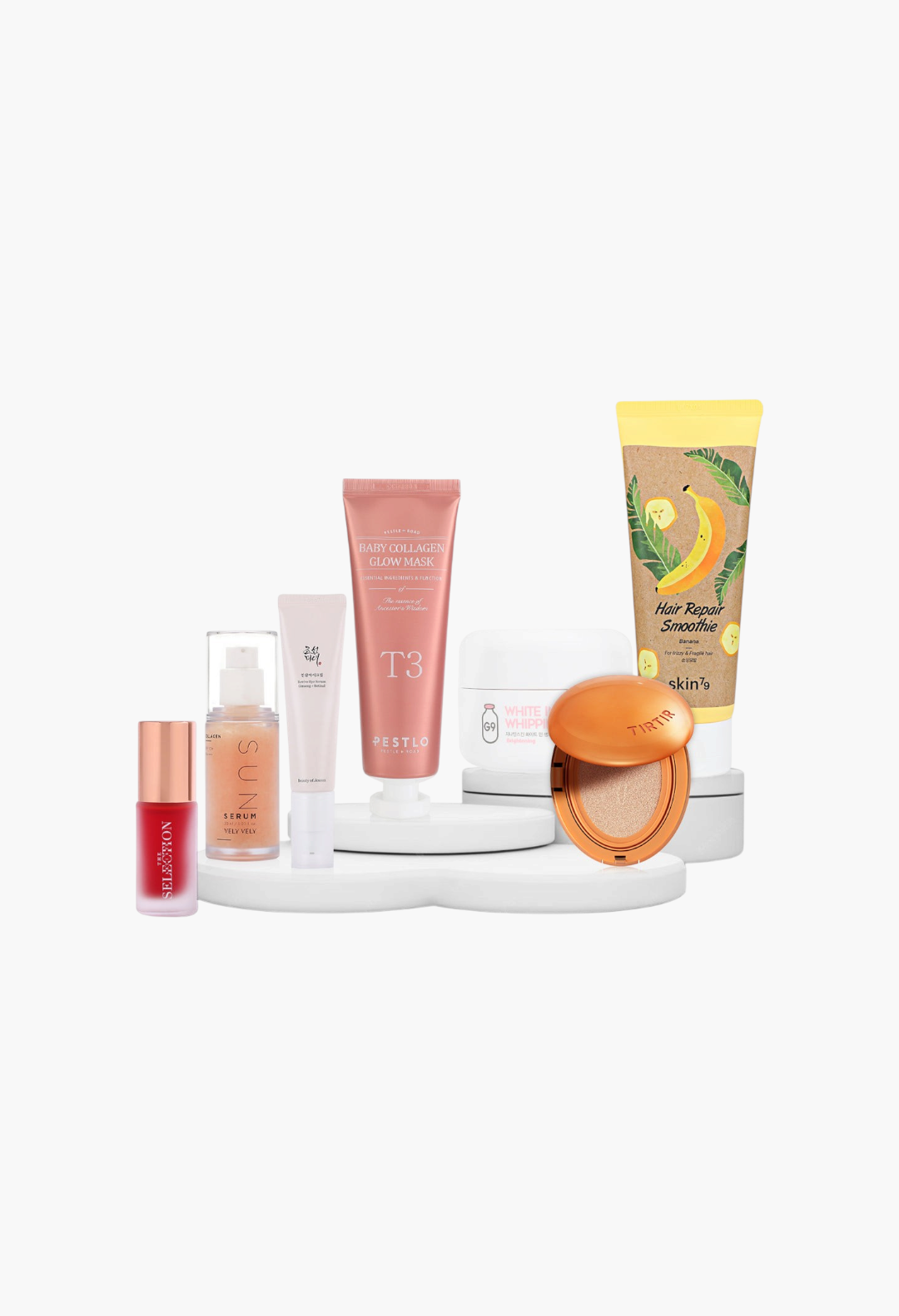 GLAM MODA Glow & Care 7-piece skincare and makeup set featuring serums, creams, masks, and cushion foundation.