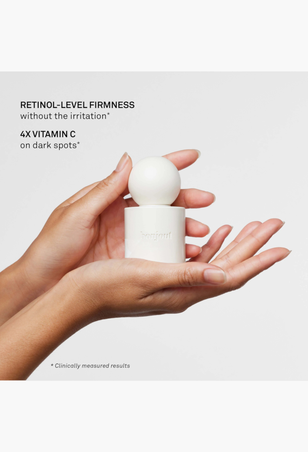 GLAM MODA La Cream Skin Longevity Crème in a white minimalist jar held in hands, promoting firming and brightening.