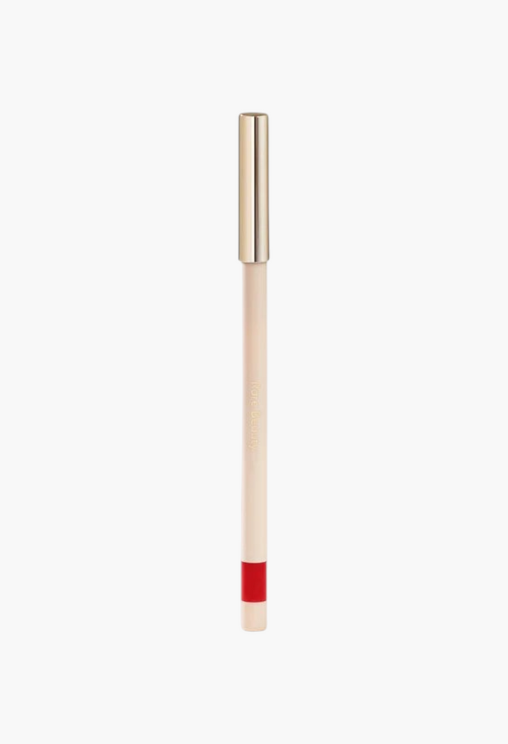 GLAM MODA Kind Words matte lip liner in a vibrant red shade with a sleek beige casing and gold cap.