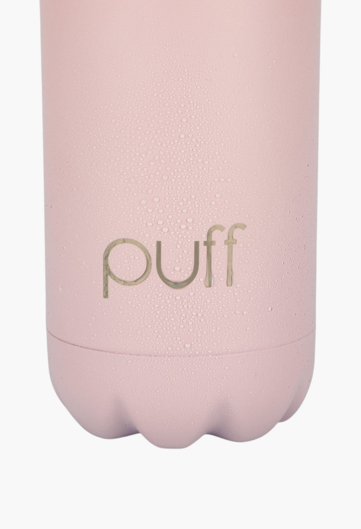 GLAM MODA matte baby pink insulated stainless steel Puff bottle with condensation droplets on the surface