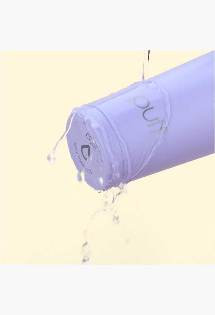 GLAM MODA light purple stainless steel insulated shaker bottle with water splashing over the vacuum-seal cap