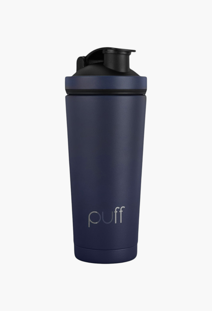 GLAM MODA Puff Shaker in matte navy blue stainless steel with a black vacuum-seal cap for cold drinks.