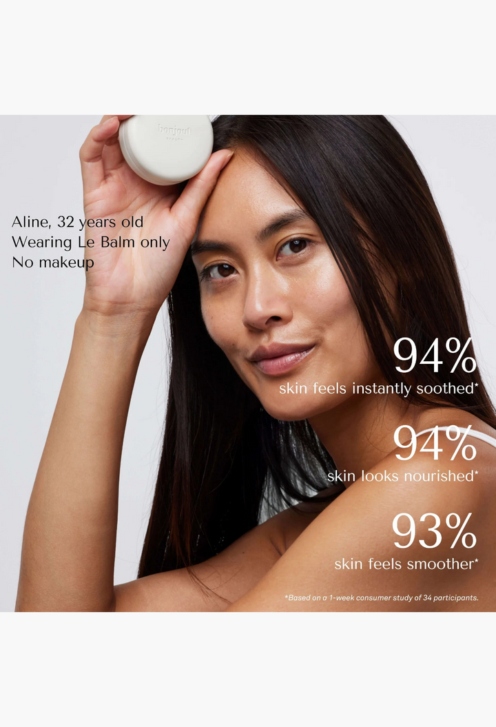 GLAM MODA Le Balm solid serum held by a woman with glowing, nourished skin, showcasing natural beauty results.