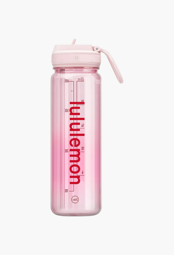 GLAM MODA Back to Life clear pink 24oz water bottle with a leakproof straw lid and vertical logo branding.