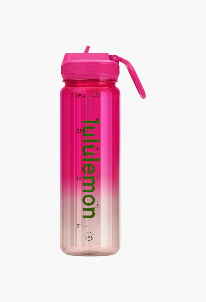 GLAM MODA Back to Life clear Tritan water bottle in pink ombre with a leakproof straw lid and green logo branding.