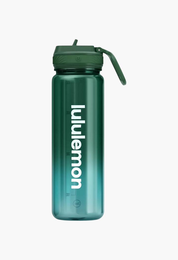 GLAM MODA 24oz green gradient water bottle with a leakproof straw lid and white logo branding on the side.