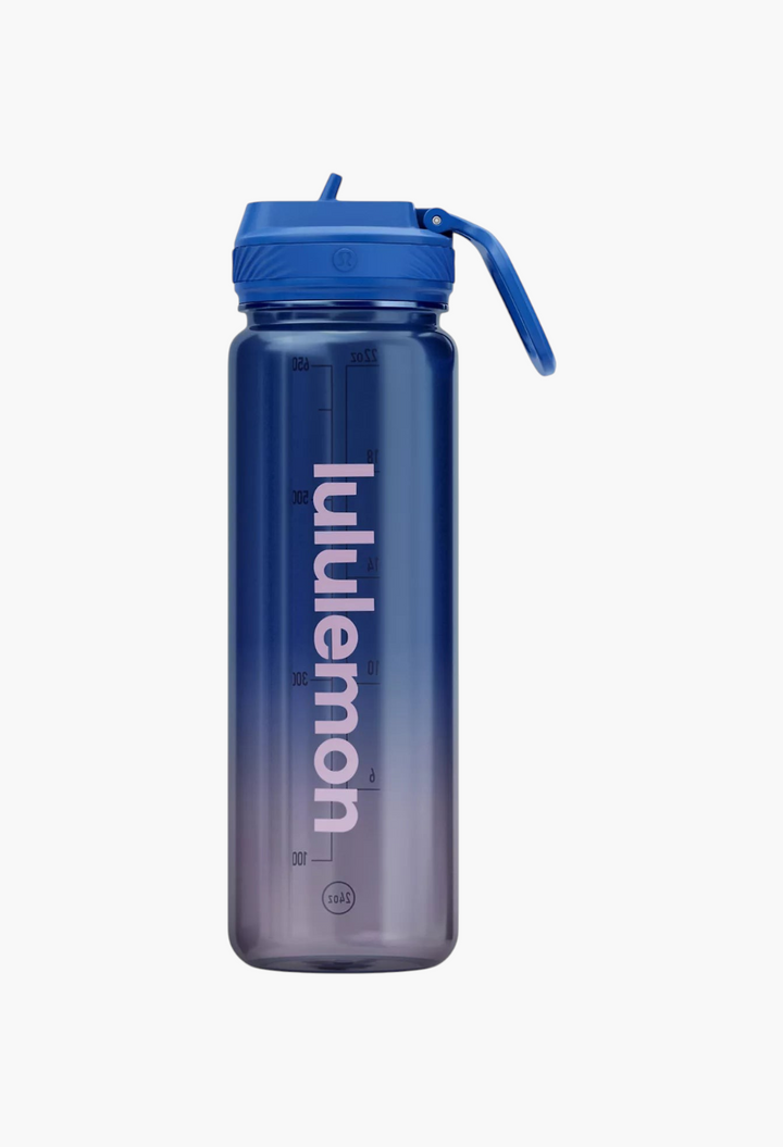 GLAM MODA Back to Life clear Tritan water bottle with a blue leakproof straw lid and vertical branding.