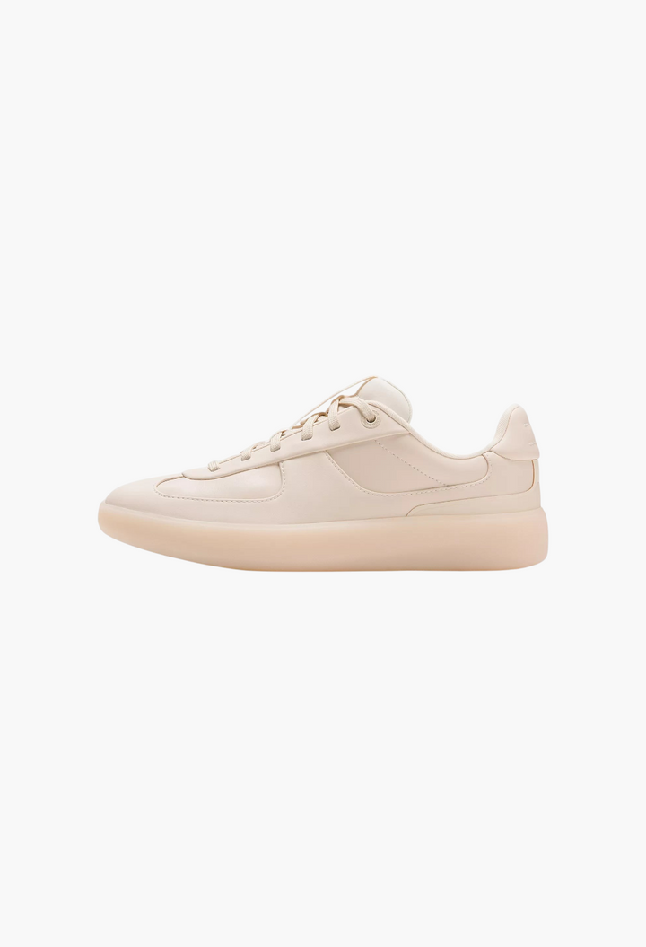 GLAM MODA Women's Cityverse sneaker in beige leather-alternative with contoured cushioning and rubber outsole.