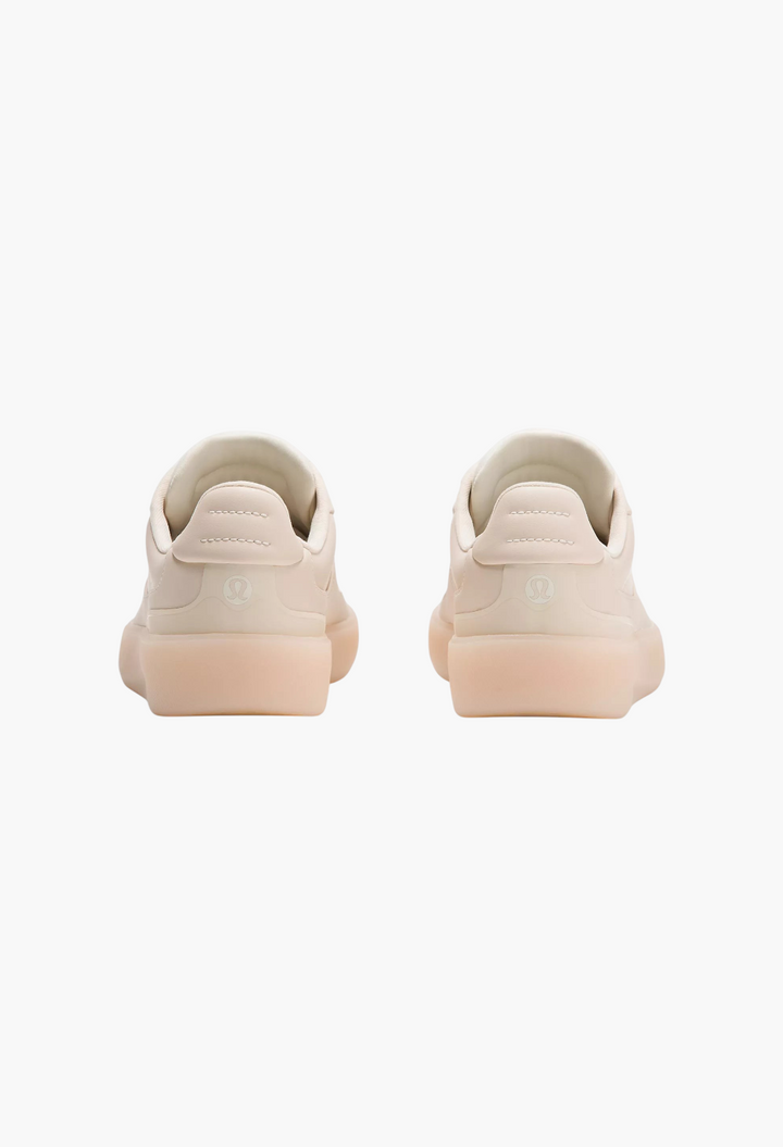 GLAM MODA Women's Cityverse sneakers in beige leather-alternative with a thick rubber outsole, rear view.