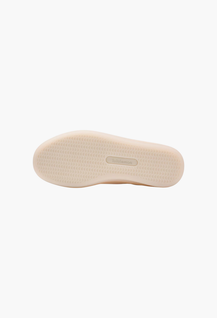 GLAM MODA Women's Cityverse sneaker showing the beige rubber outsole with textured grip pattern