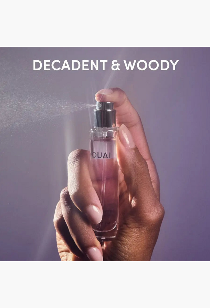 GLAM MODA travel-sized Laurel Canyon Eau de Parfum spray bottle with woody notes of fig leaf, jasmine, and cedarwood.
