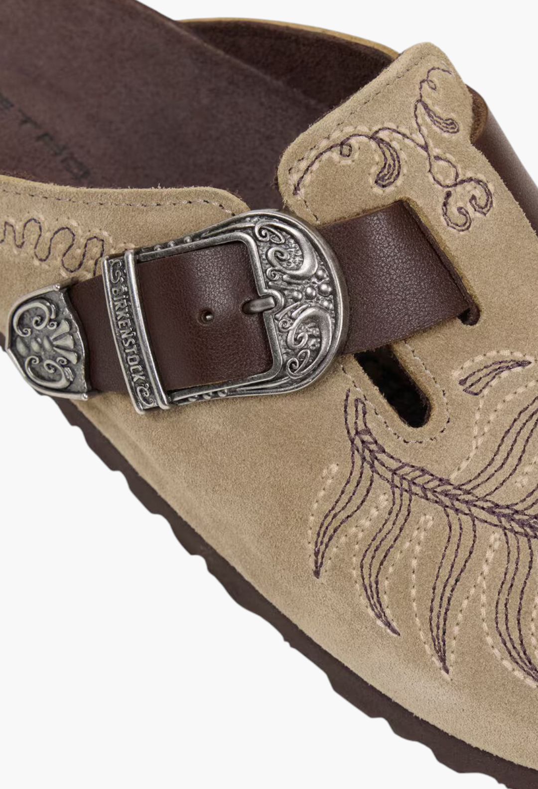 GLAM MODA Birkenstock Boston suede clog featuring intricate floral embroidery, Western-style buckle, and leather strap.