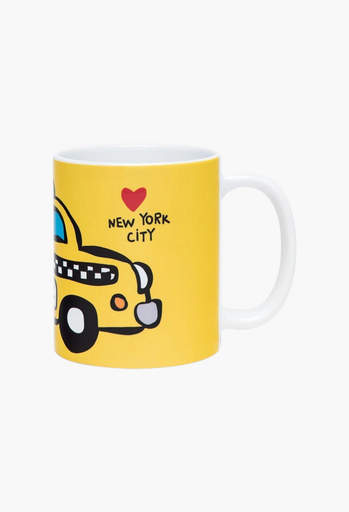 GLAM MODA ceramic mug featuring a yellow NYC taxi illustration by Marc Tetro with a red heart and text
