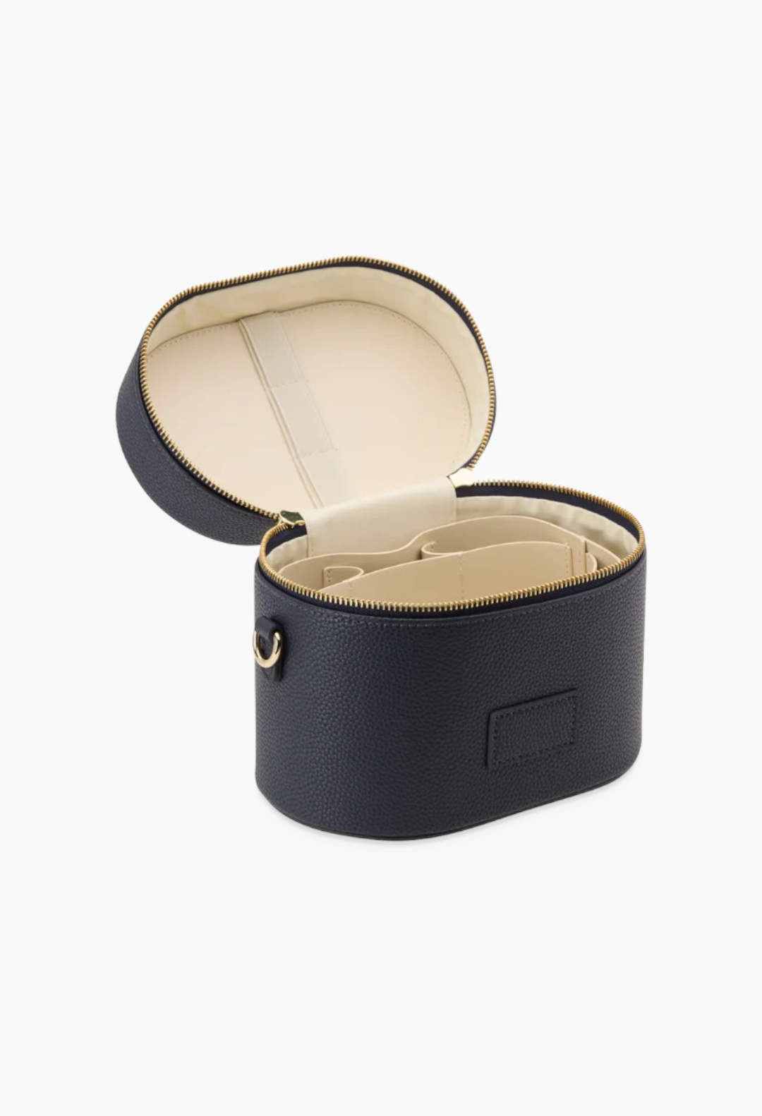 GLAM MODA navy blue oval vegan leather toiletry case with removable interior divider and cream-colored lining.