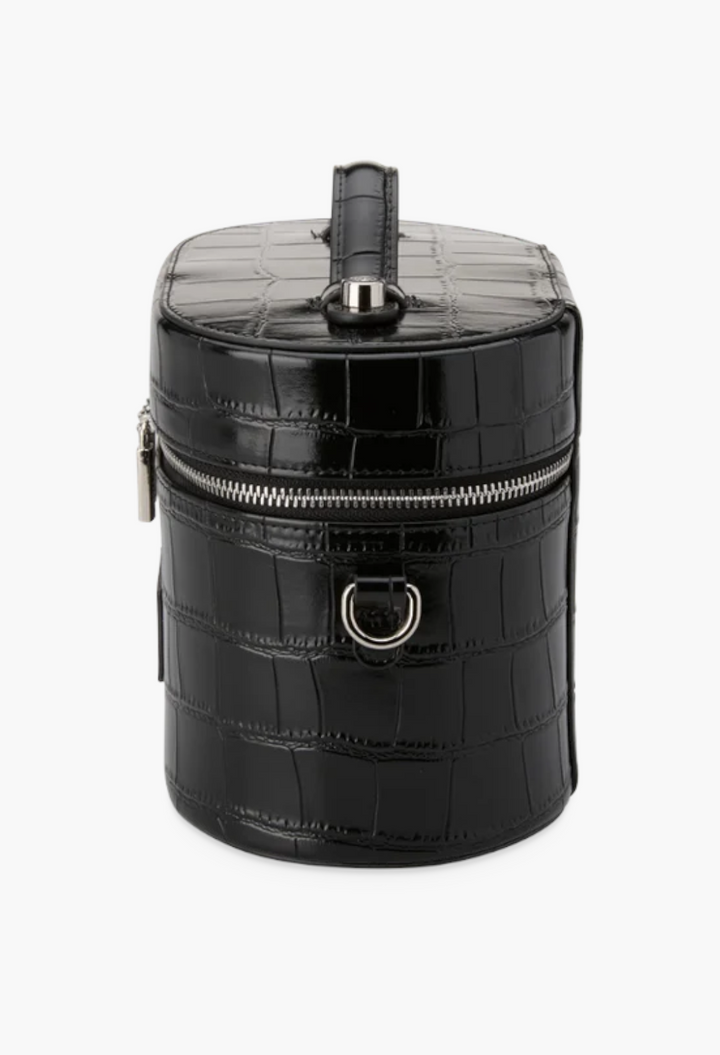 GLAM MODA black oval toiletry case in croc-embossed vegan leather with a top handle and silver hardware.